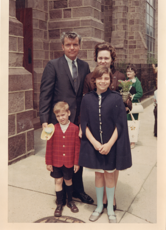 A man, woman, boy, and girl outside of the church at 18th and Spring Garden Streets