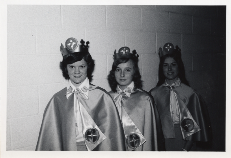 Three missionettes pose for a portrait