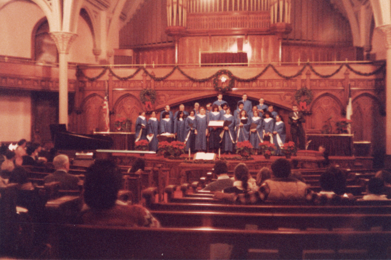Highway's choir sings in the sanctuary which is decorated for Christmas