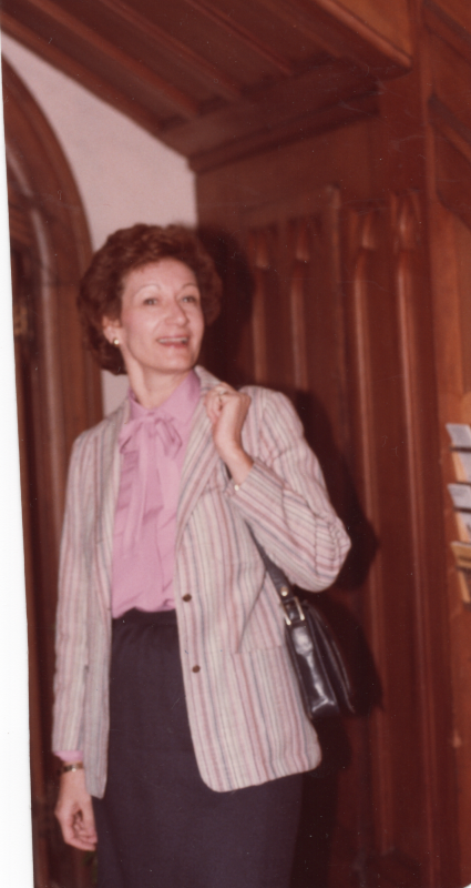 A woman smiles for a portrait