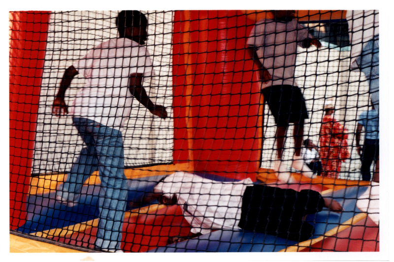 Boys play in a balloon house
