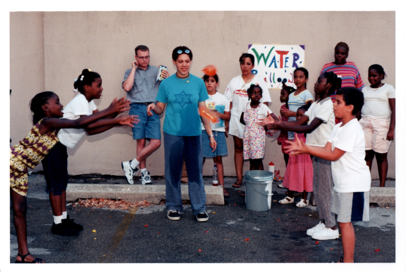 Children play with water balloons