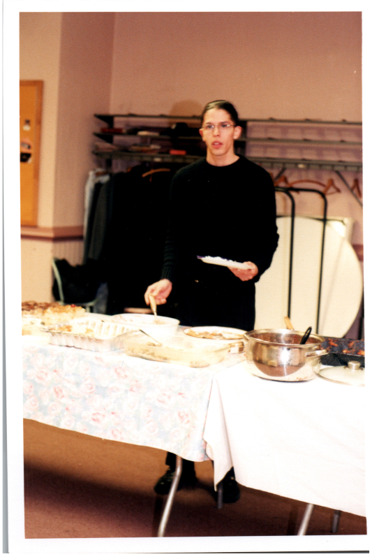 Congregants serve themselves from a buffet