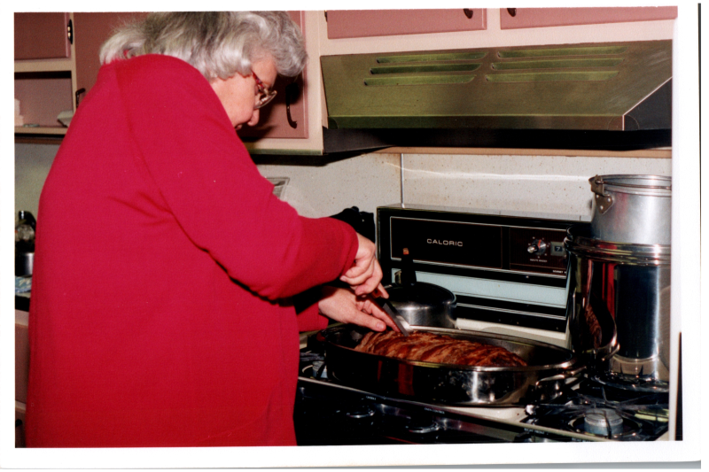 A woman cuts a dish