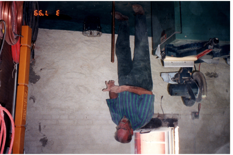 A man works inside the parsonnage