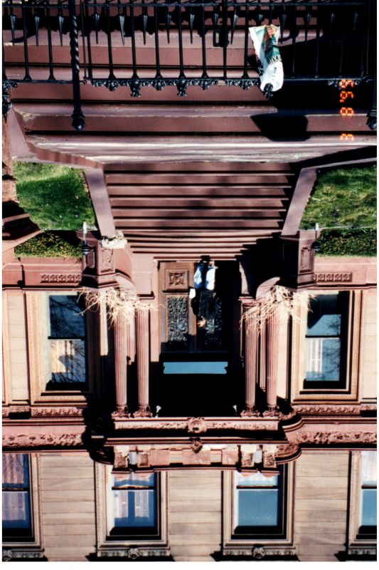 A man poses with a home exterior