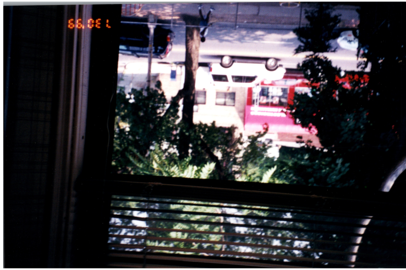 Picture of the sidewalk from a window