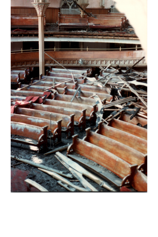 Collapsed paneling and ash on Highway's pews