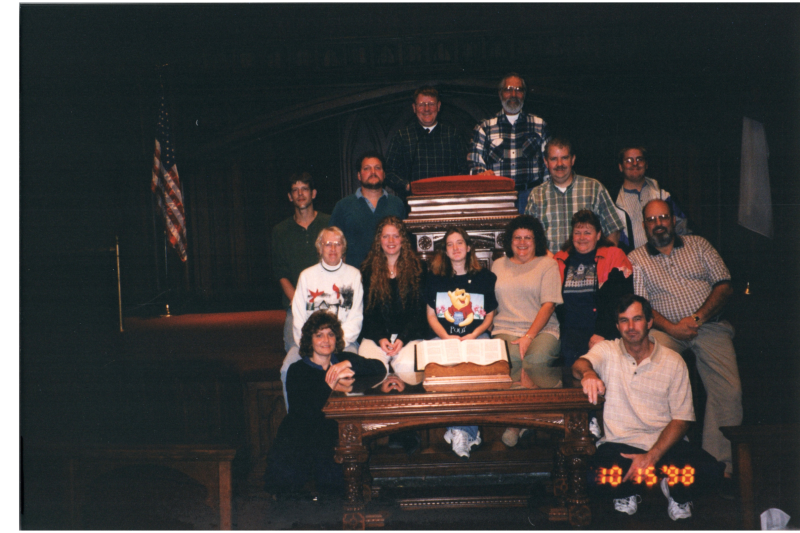 A group smiles together in Highway's sanctuary
