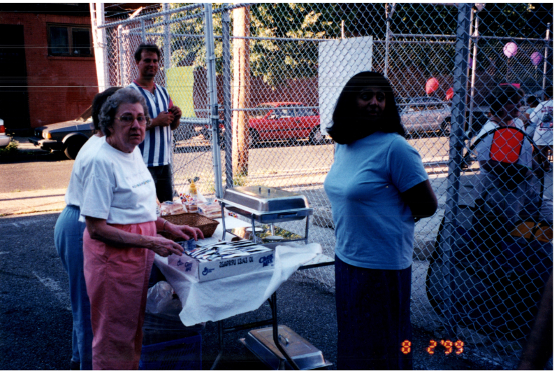 A group sets up a food table