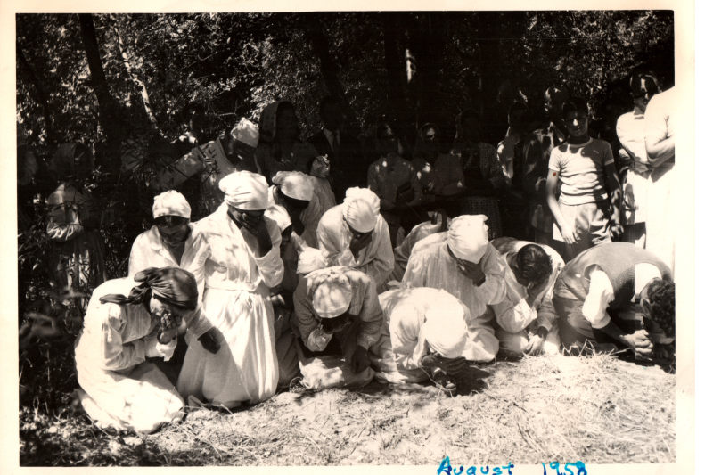 Picture of women crying on their knees. A caption reads, "Falling prostrate on their knees whiling preaching, receiving the baptism (candidates), Aug. 1959." Image from Fred Reina, missionary to Italy
