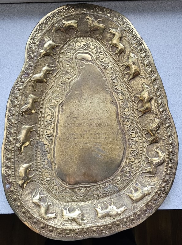 Golden plate presented to Highway for one of its anniversaries