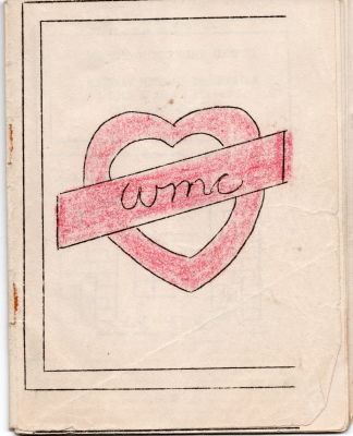 Cover with a colored-in red heart with a badge through the middle reading "WMC"