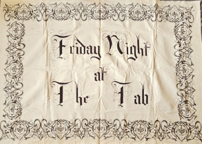 Canvas banner reading, "Friday Night at the Tab"